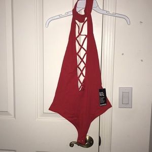NWT deep cut red bodysuit